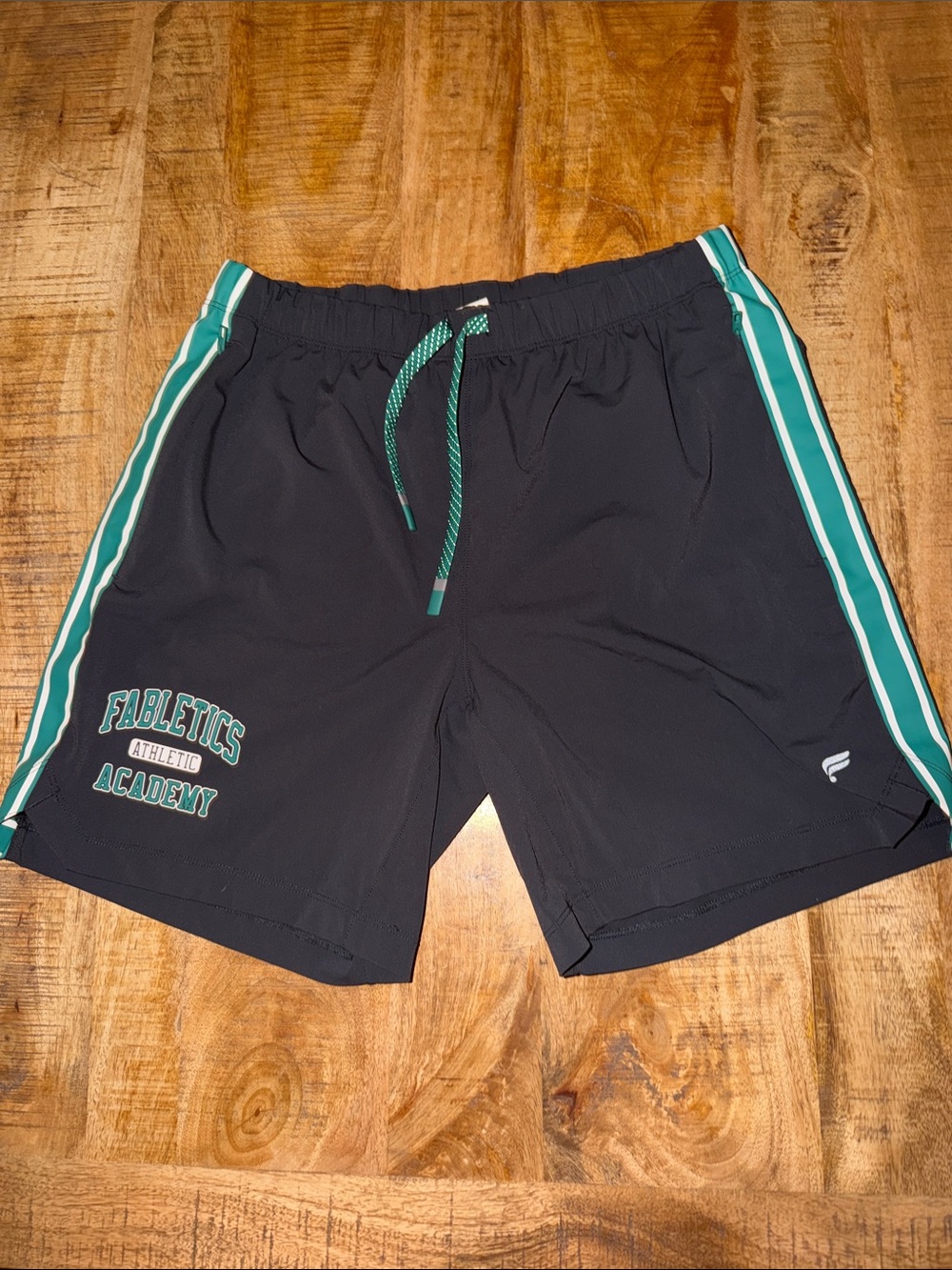 Fabletics Men’s Black Athletic Shorts with Teal Trim